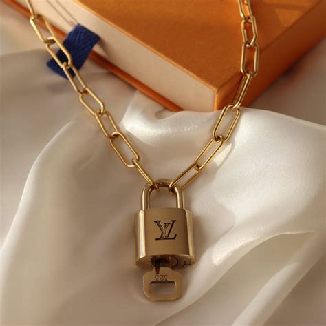 louis vuitton pendant lock|Louis Vuitton lock necklace.